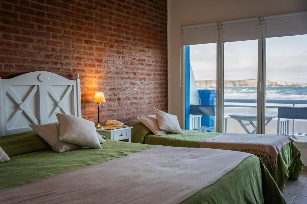 פורטו פיראמידס Rayentray Las Restingas Hotel De Mar מראה חיצוני תמונה